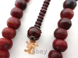 Perles de prière tibétaines anciennes en ambre de cerisier sculpté avec compteurs en bois.