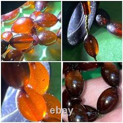 are et unique perle de prière islamique en ambre de cerisier faturan antique bakélite 33 perles 15 grammes.